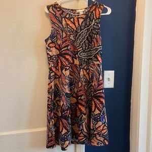 H&M dress. Diamond shape style in back.